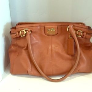 Coach camel colored purse with gold details